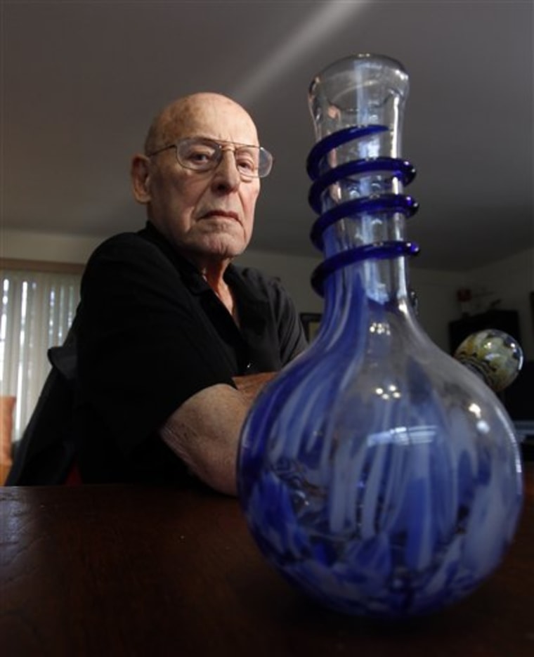 Medical marijuana user Joe Schwartz, 90, poses for a picture at his home in Laguna Woods, Calif., Wednesday, June 1, 2011. Schwartz is a 90-year-old great-grandfather of three who enjoys a few puffs of pot each night before he crawls into bed in the Southern California retirement community he calls home.(AP Photo/Chris Carlson)